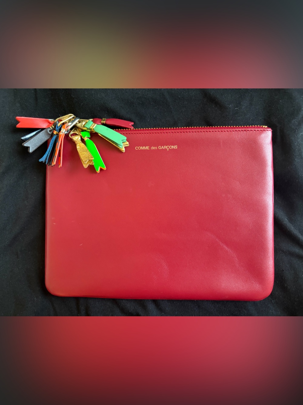Comme des Garçons Red Leather Wallet Sleeve with Multicolor Tassel Accents